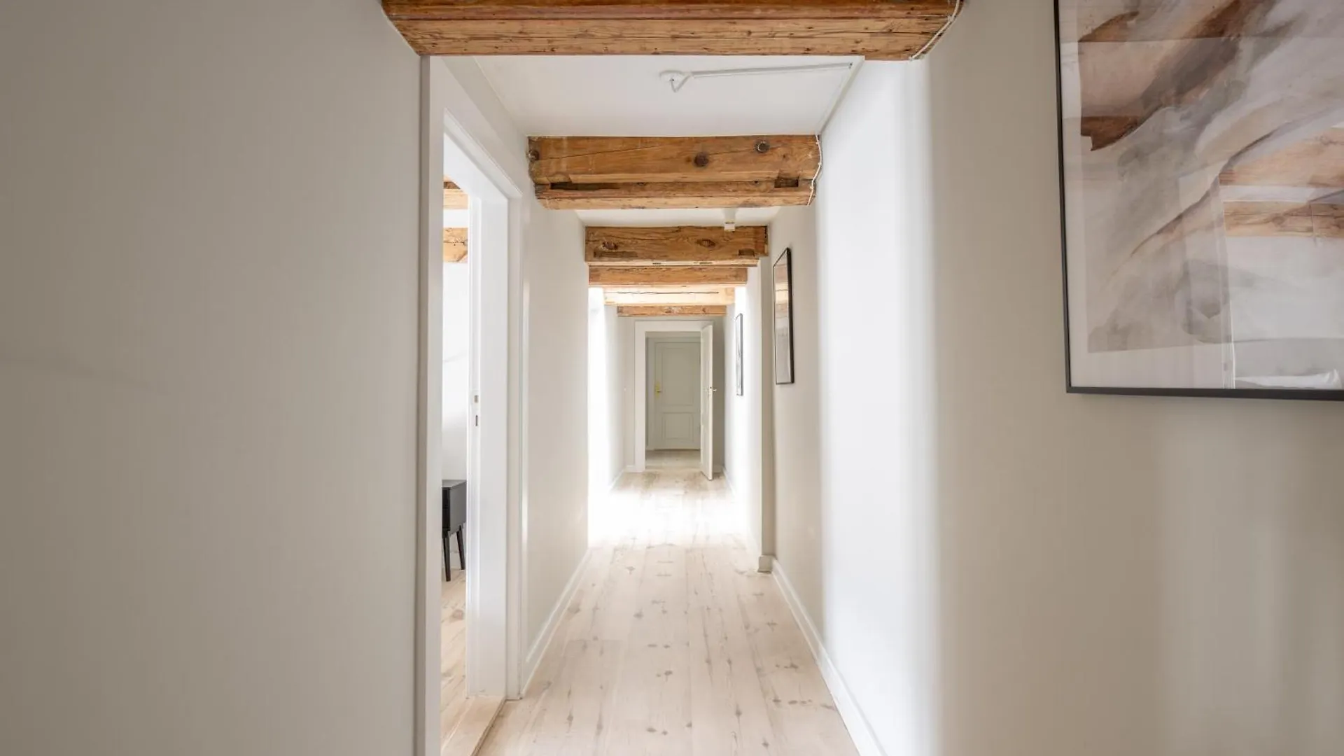 City Apartment With Exposed Ceiling Beams Copenhagen